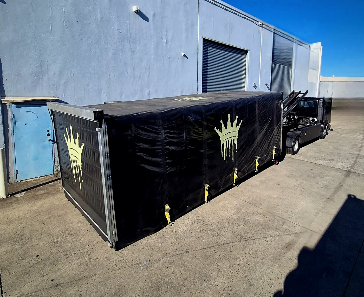 HaulKing's enclosed crown trailer: fully covered, closed-frame car transport