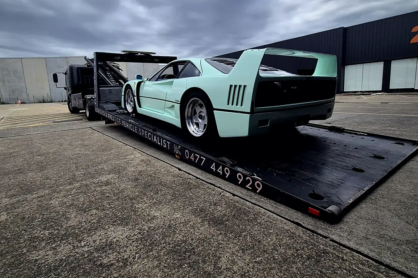 Mint green Ferrari F40 loaded on HaulKing's branded tray in Sydney