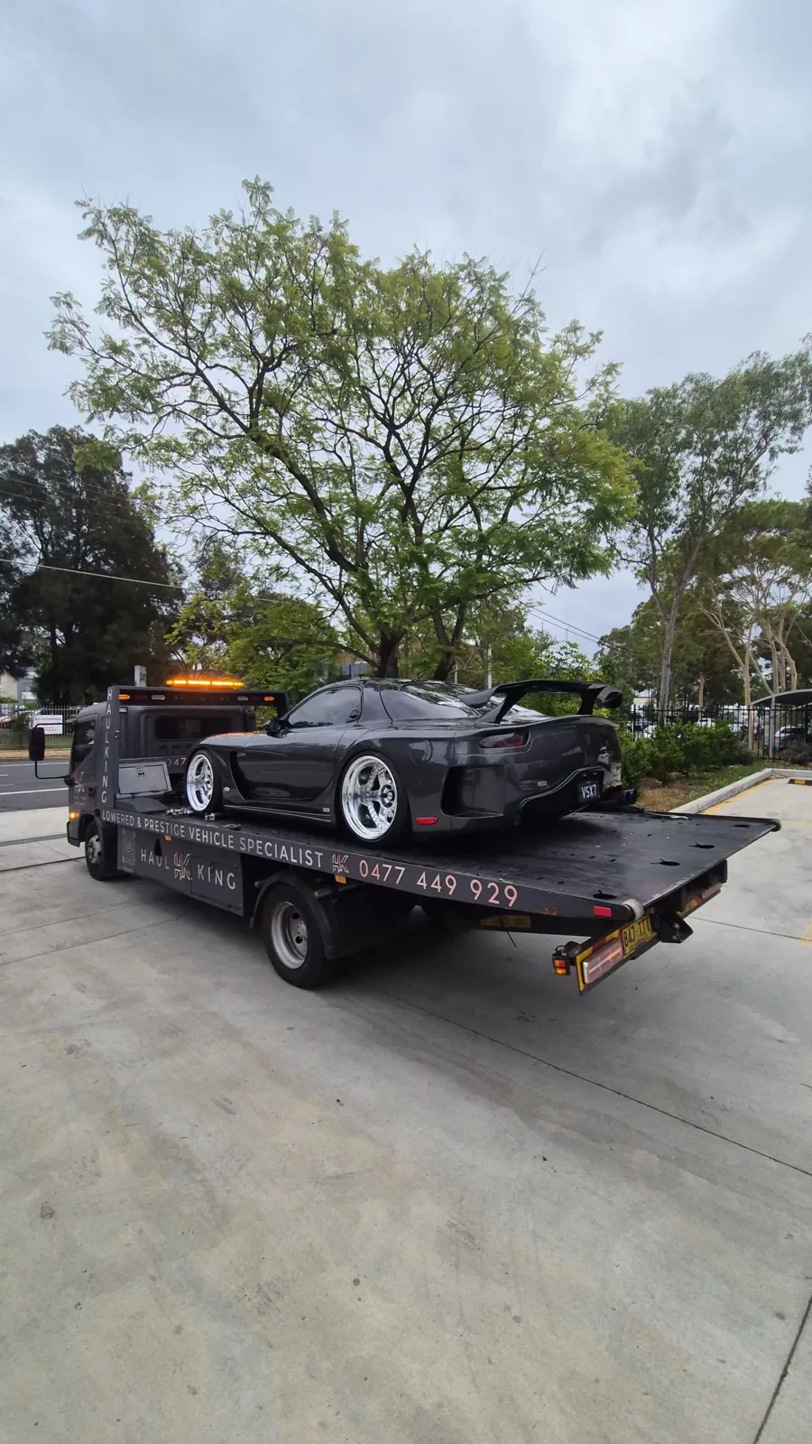 Single-seater race car loaded on HaulKing's tray in Sydney
