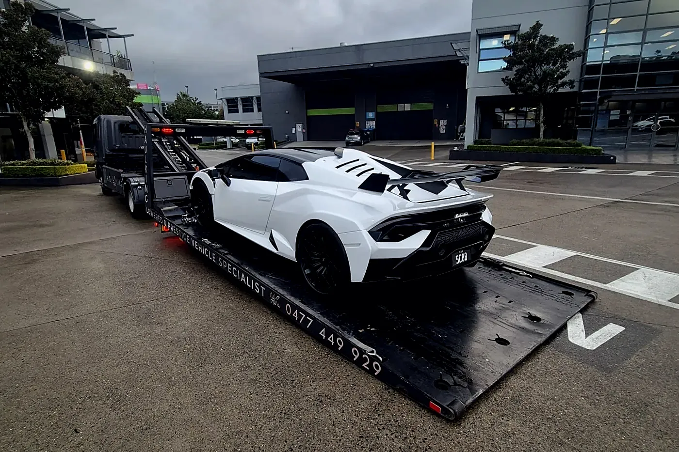 White Lamborghini Huracán on HaulKing's low-entry tray in Sydney