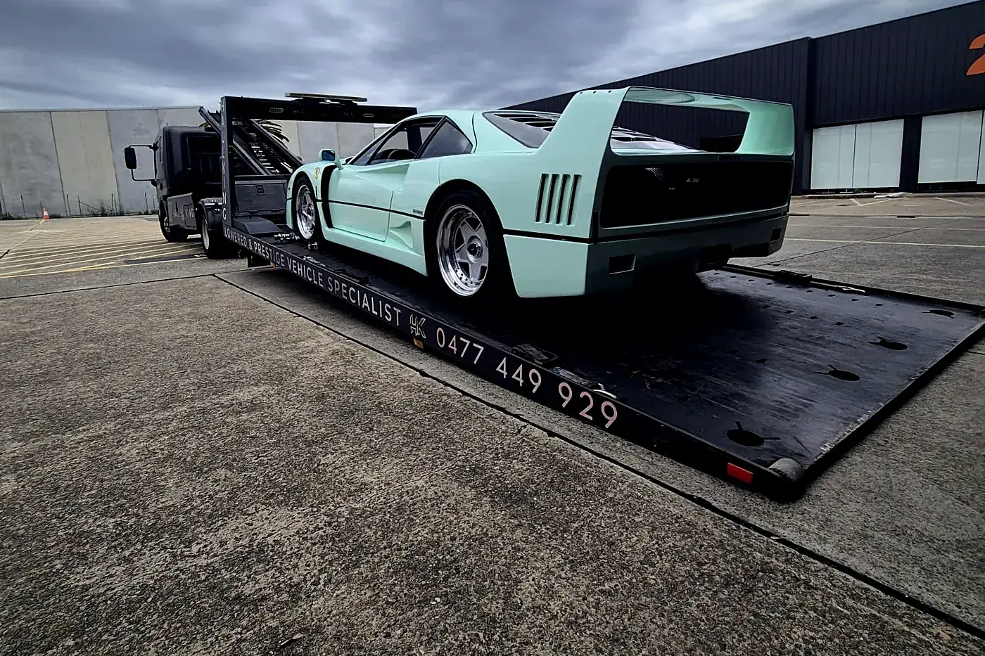 Mint green Ferrari F40 on HaulKing's tray, Lowered & Prestige Vehicle Specialist livery