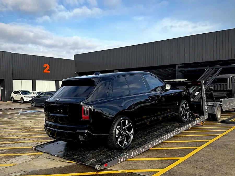 Black Rolls-Royce Cullinan Black Badge loaded on HaulKing's low-angle tray